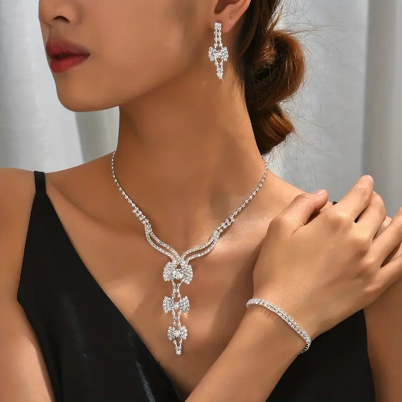 Women 3-Tier Bow Y-Drop CZ 3Pcs Jewelry Set, Rhodium Plated Necklace Dangle Earrings Tennis Bracelet Bridal Formal Jewelry